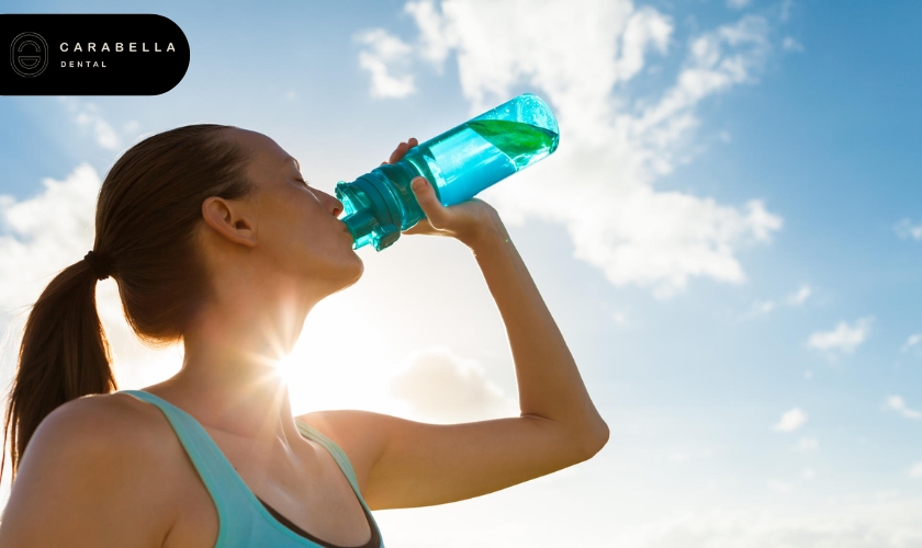 How To Drink Flavored Water Without Damaging Your Teeth