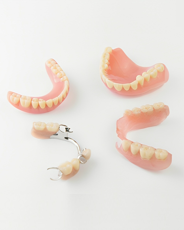 various types of dentures including partial and full sets on display in alexandria